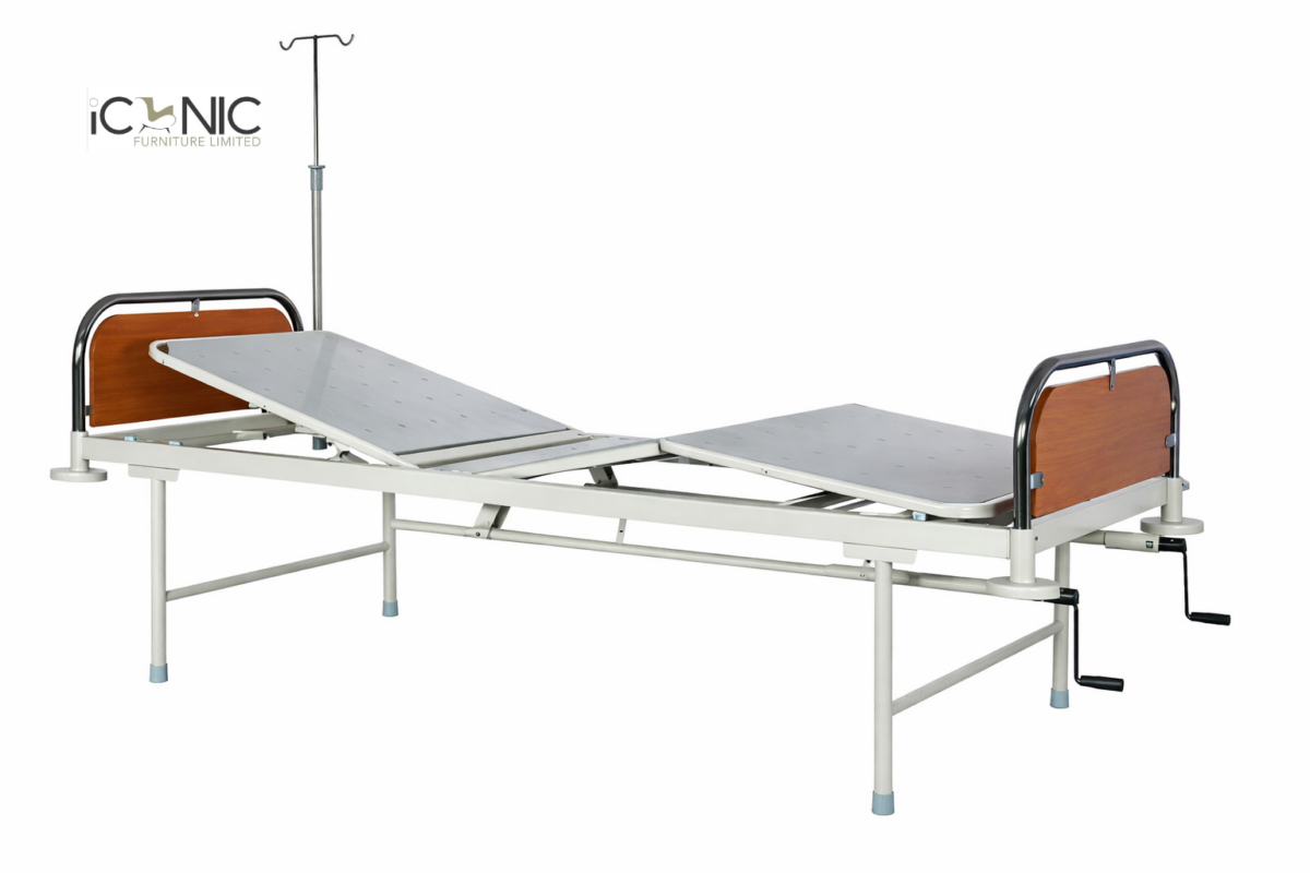 Adjustable hospital bed with IV pole for patient care