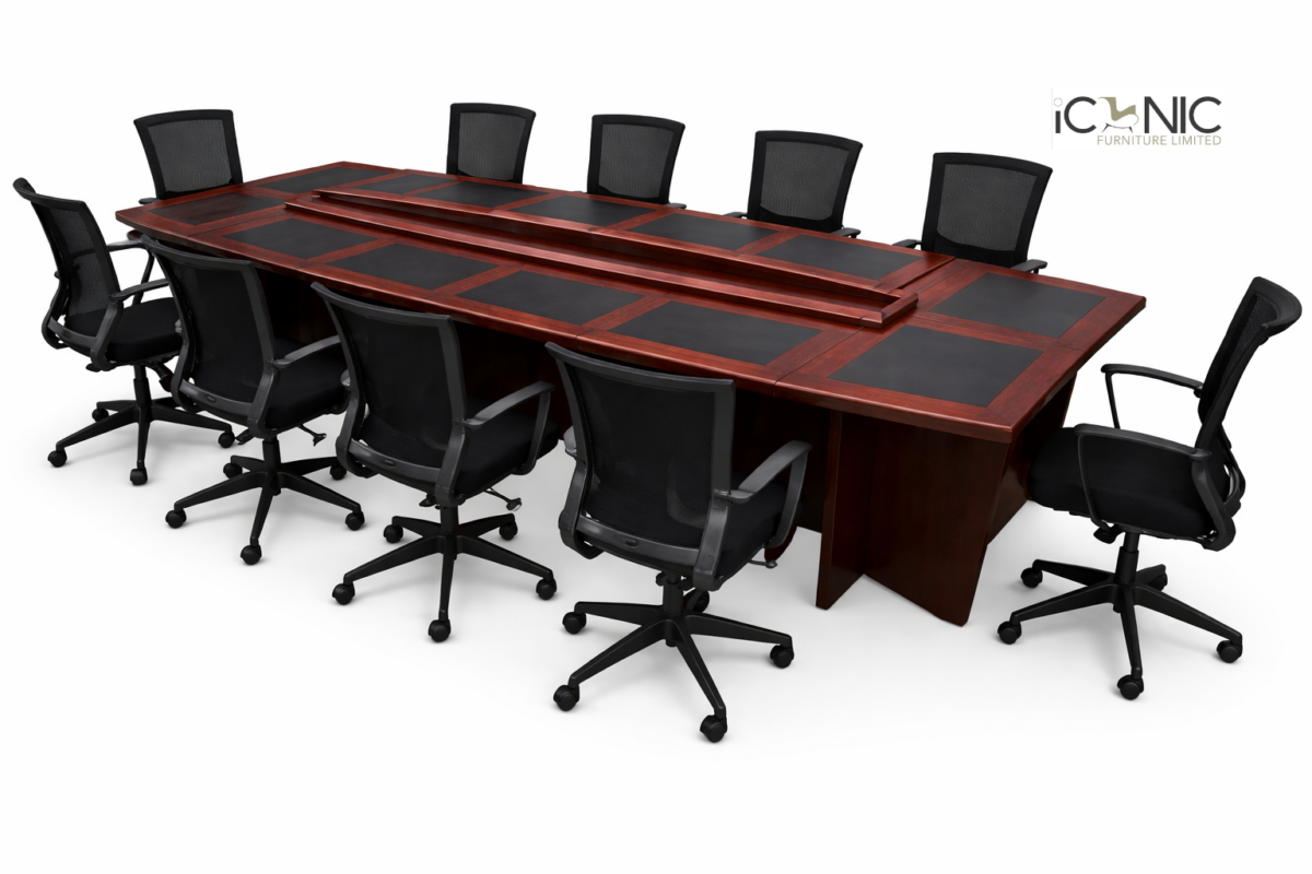 Large wooden boardroom conference table with black leather inlays and ergonomic mesh chairs by Iconic Furniture Limited Bangladesh.