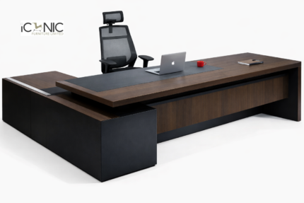 Modern L-shaped executive director table with walnut finish and black leatherette top by Iconic Furniture Bangladesh.