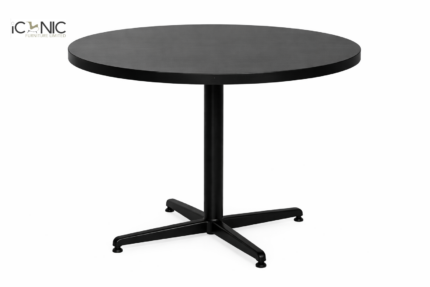 Matte black round café table with a sturdy four-prong metal pedestal base by Iconic Furniture Limited.