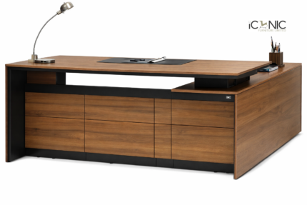 Modern L-shaped executive director table with walnut wood finish and integrated side storage cabinet for corporate offices in Bangladesh.