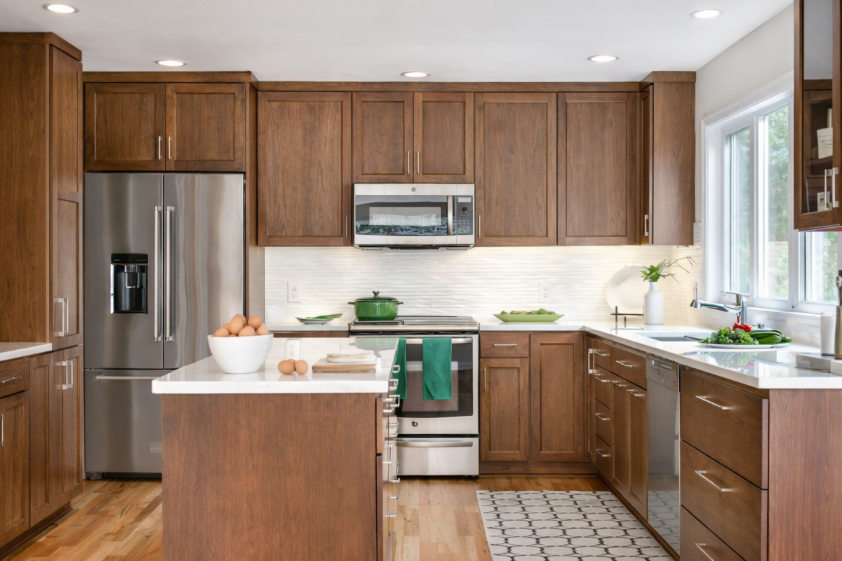 modern wooden kitchen cabinet with white countertop and island storage